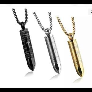 3 urns black, silver and gold